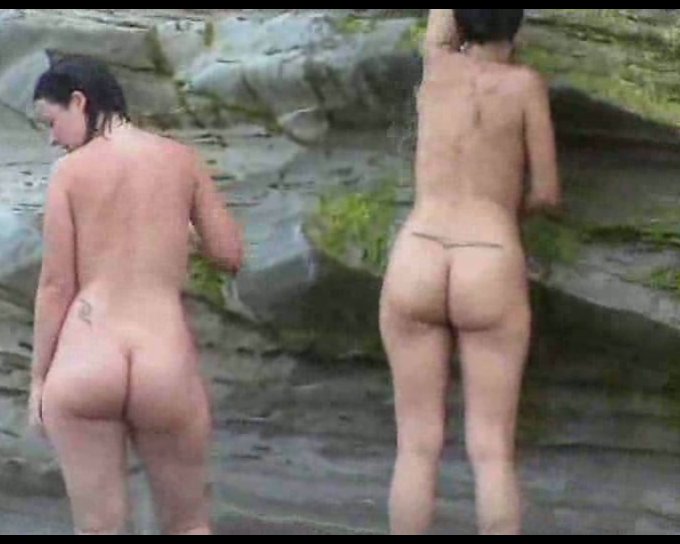 Two Curvy Latina Chicks Expose Their Big Asses On The Nude Beach