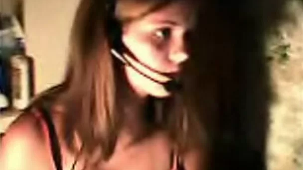 Adorable teeny webcam whore pulls up her top exposing her tits