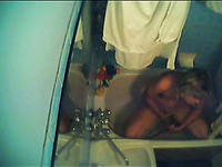 Slutty blonde girlfriend masturbating in the bath tub