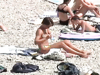 A lot of beautiful nude chicks got caught on cam on nudist beach