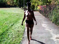 Bootylicious ebony girlfriend walking in the park topless