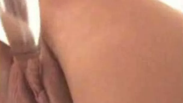 My torrid blonde girlfriend pokes her snatch with huge dildo