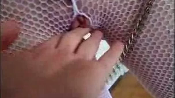 Sexy and lascivious blonde whore in fishnet outfit getting facialized