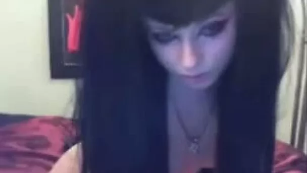 Raven haired torrid hottie masturbates hard on sofa