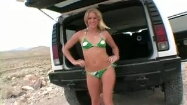Hottie takes off her tight and sexy bikini next to her car