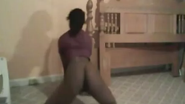 Skinny black teen chick on webcam gets naked and dances