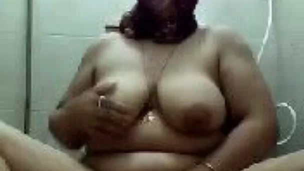Arab BBW lady covers her face and gets naked on webcam