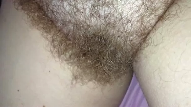 Fat and hairy jungle pussy filmed closeup and fingered