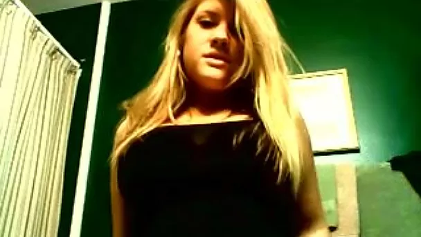 Slutty blonde milf on webcam flashing her big boobies