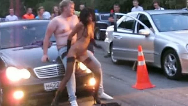 The crazy stripper girl in Russia on the car race show