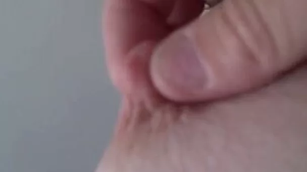 Beautiful and petite pink nipples of my wife closeup
