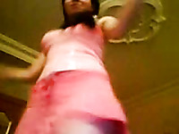 Sweet brunette honey in pink dress dancing for me on cam