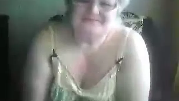 Fat and nasty granny on webcam flashes and masturbates