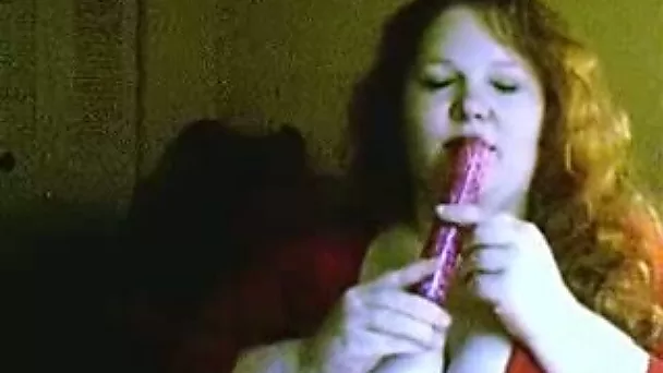 Cock hugry curly BBW sucks her fancy toy with pleasure
