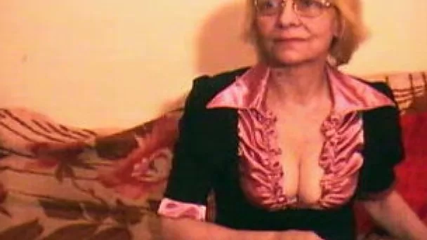 Blonde granny with saggy boobies on webcam getting naked for me
