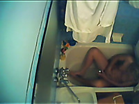 Wife in the bath tub masturbating on hidden cam video