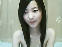 Hot and skinny Chinese brunette teen masturbating on webcam