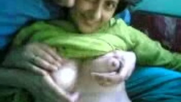 Petite Indian wife flashes her tits during sex on cam