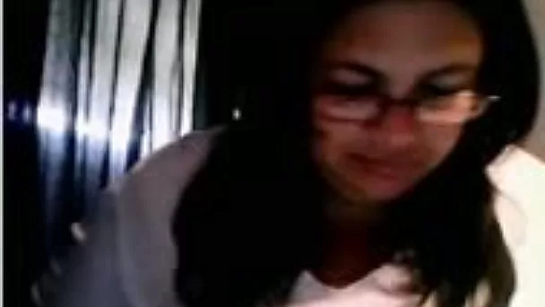 Palatable nerdy brunette demonstrates her elastic tits