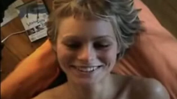 My lovely short-haired blondie looks happy during the sex