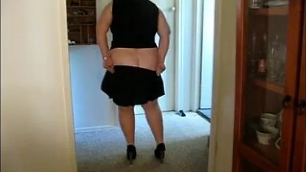 Fat white bitch takes off her skirt in the corridor to rub her pussy