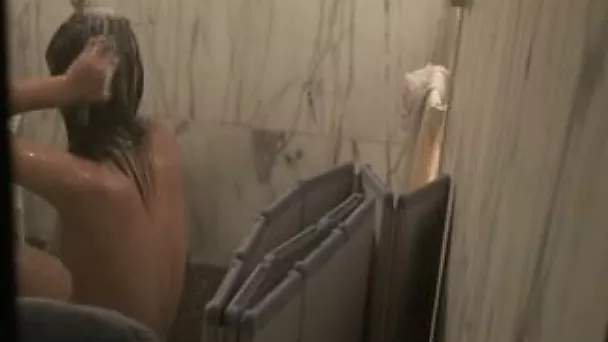 My young brunette Asian girlfriend in the bathroom spied on