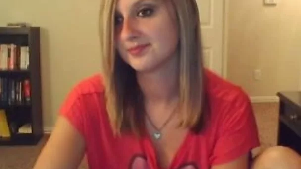 Very cute blonde girl flashes her small tits on webcam