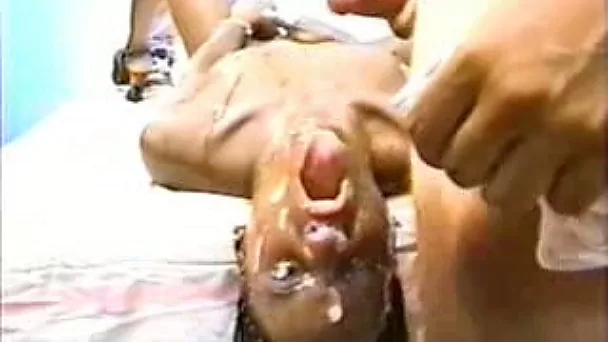 Insaiable ebony strumpet loves gallons of jizz on her face