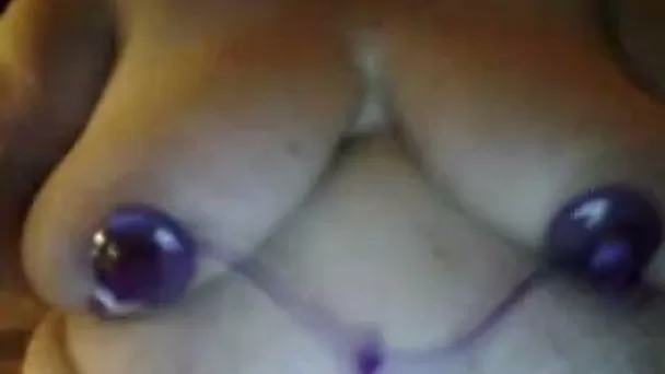 This BBW whore loves playing with her massive hooters on camera