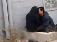 Spying on a horny couple cuddling and fucking outside