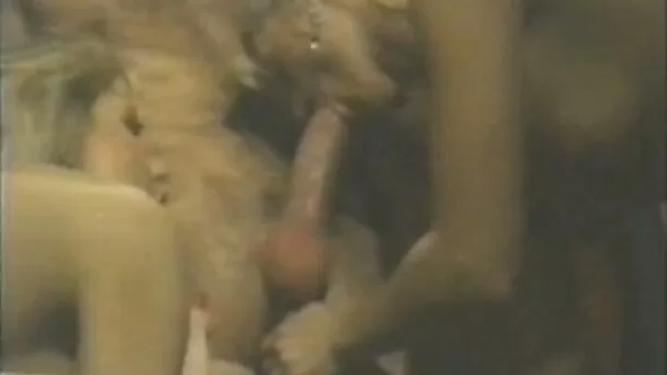 Two slim blondies give double blowjob to a hot guy