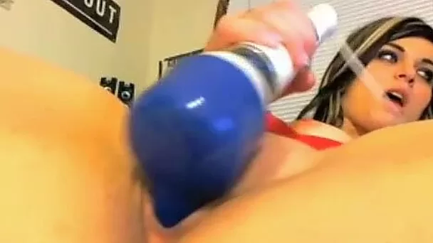Hot  brunette sex doll masturbates ardently on sofa