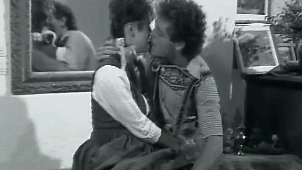 Short-haired slut makes out with a guy and gives him a blowjob
