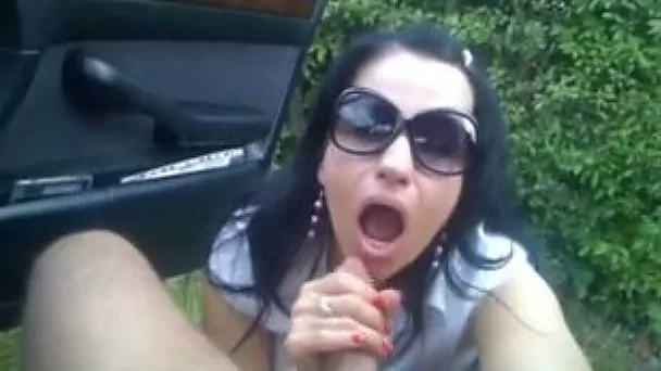 Woman in sunglasses works on my cock like a pro outdoors