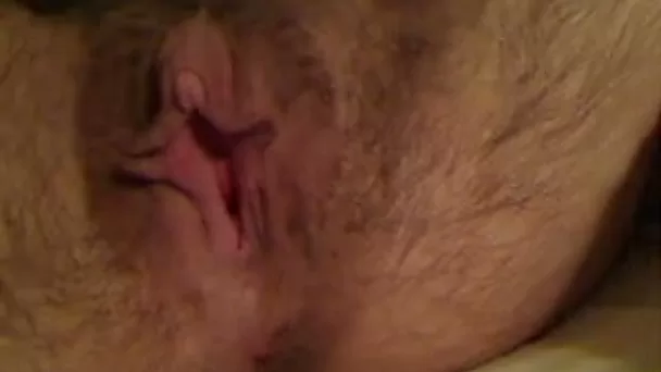 Fucking hairy bitch plays with her snatch in front of a camera