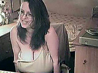 Nerdy brunette wifey showing off her big juggs on webcam