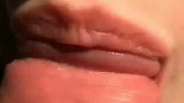Soft pink lips of my girlfriend wrapped around my dick