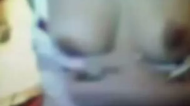 Cute and young Chinese chick on webcam flashes her perky boobs