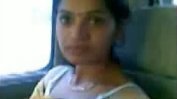Petite Indian brunette wife in the car flashes her beautiful boobs