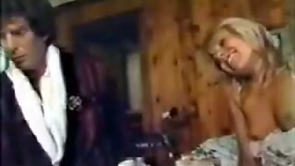 Nasty retro blonde allows a guy to spank her booty