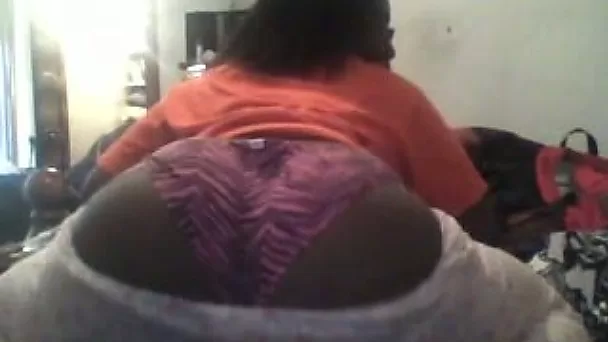 Just a big juicy black ass in pajamas filmed from behind