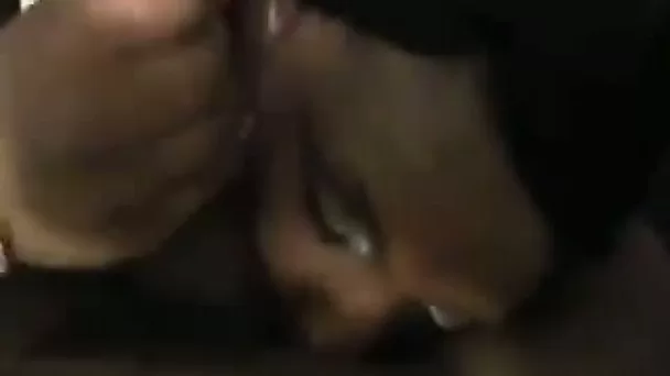 Black slut takes massive cock in her mouth before going to bed