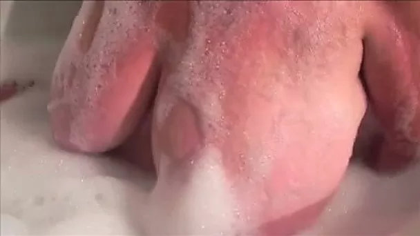 Watch my huge-breasted lustful wife taking a soapy bath