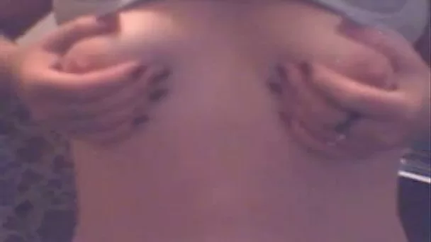 Skinny white bitch plays with her small titties and her wet pussy