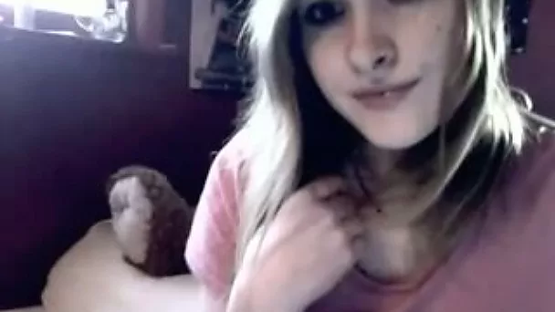 Petite and sexy blonde teen licks her fingers and feet