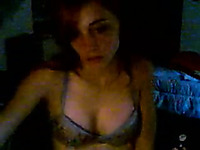 Petite redhead webcam slut rubbing her tits for me