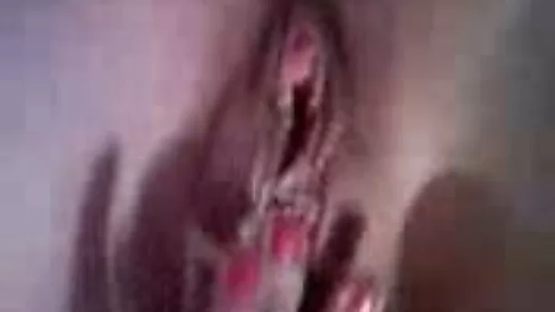 My nasty wife makes her cunt get wet by poking it with vibrator