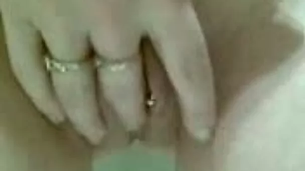 Busty and petite girlfriend teasing her pussy with fingers
