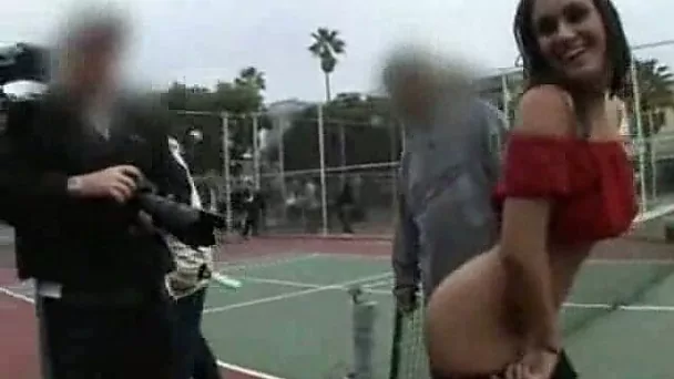 My shameless brunette bitch exposes her goodies on tennis court