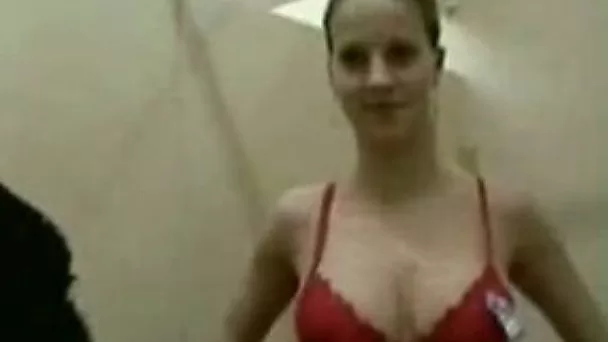 My busty blonde GF gives me a blowjob in fitting room